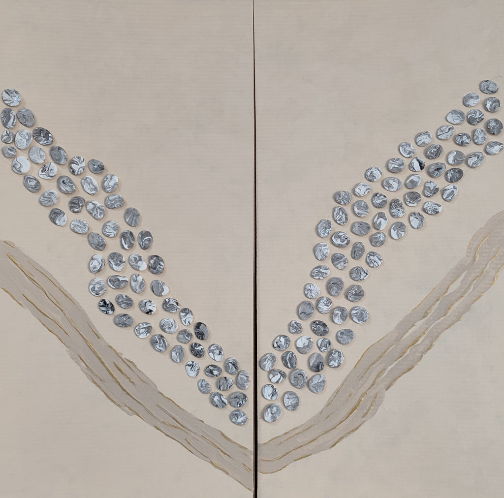 Decorative wall art with blue circular patterns on a beige background