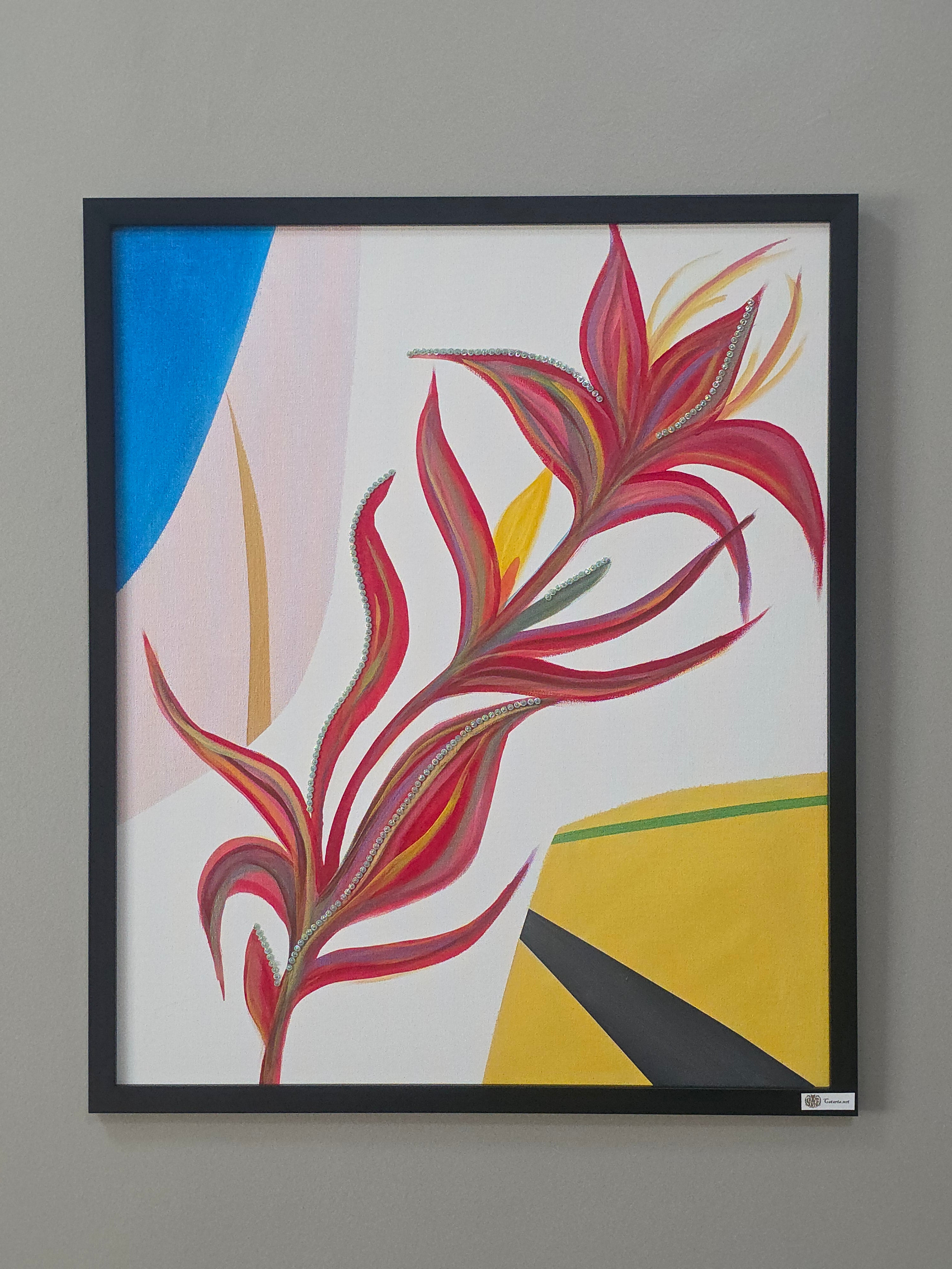 Abstract artwork with red and yellow abstract shapes on a gray wall