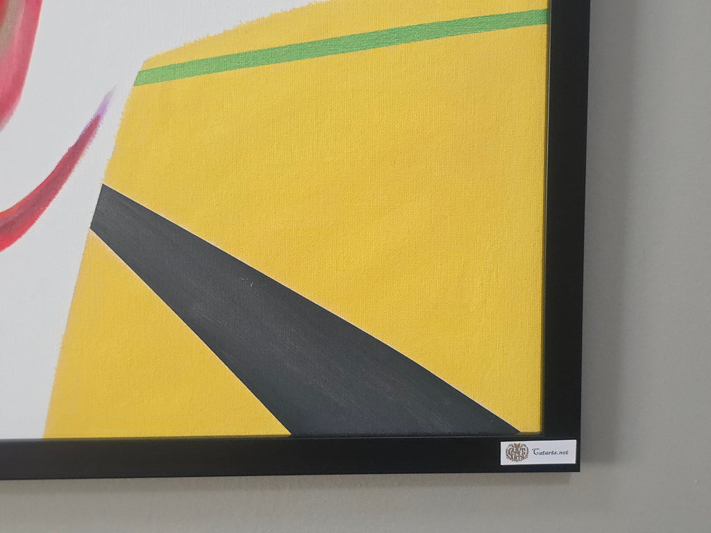 Framed abstract artwork with geometric shapes on a gray wall