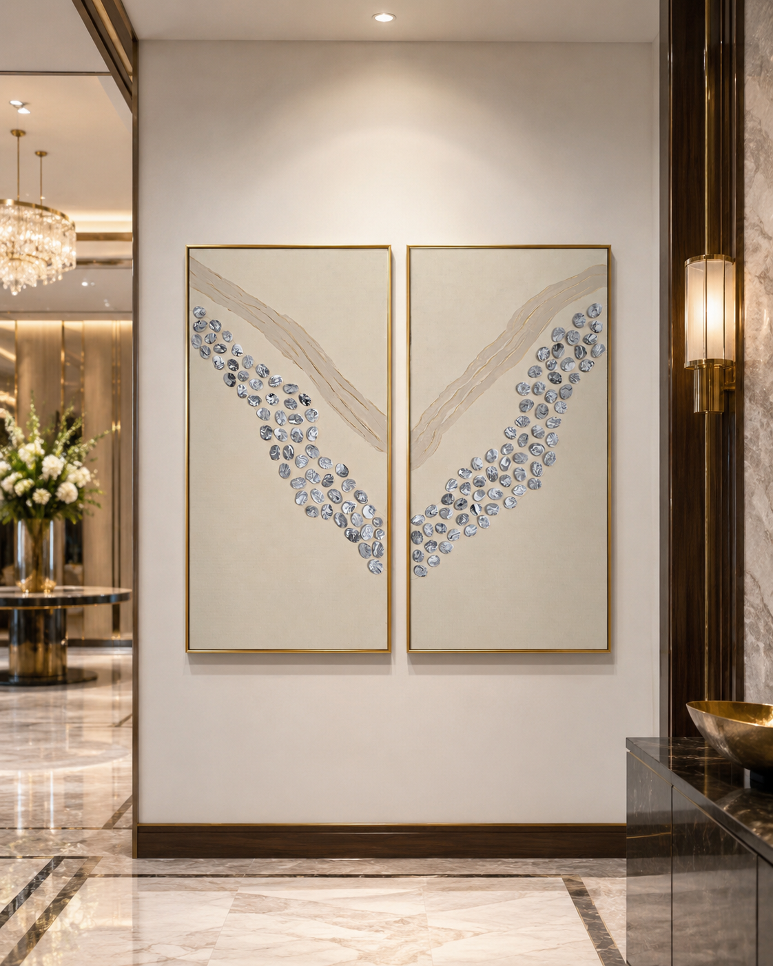Two abstract wall art pieces on a wall in a stylish interior setting.