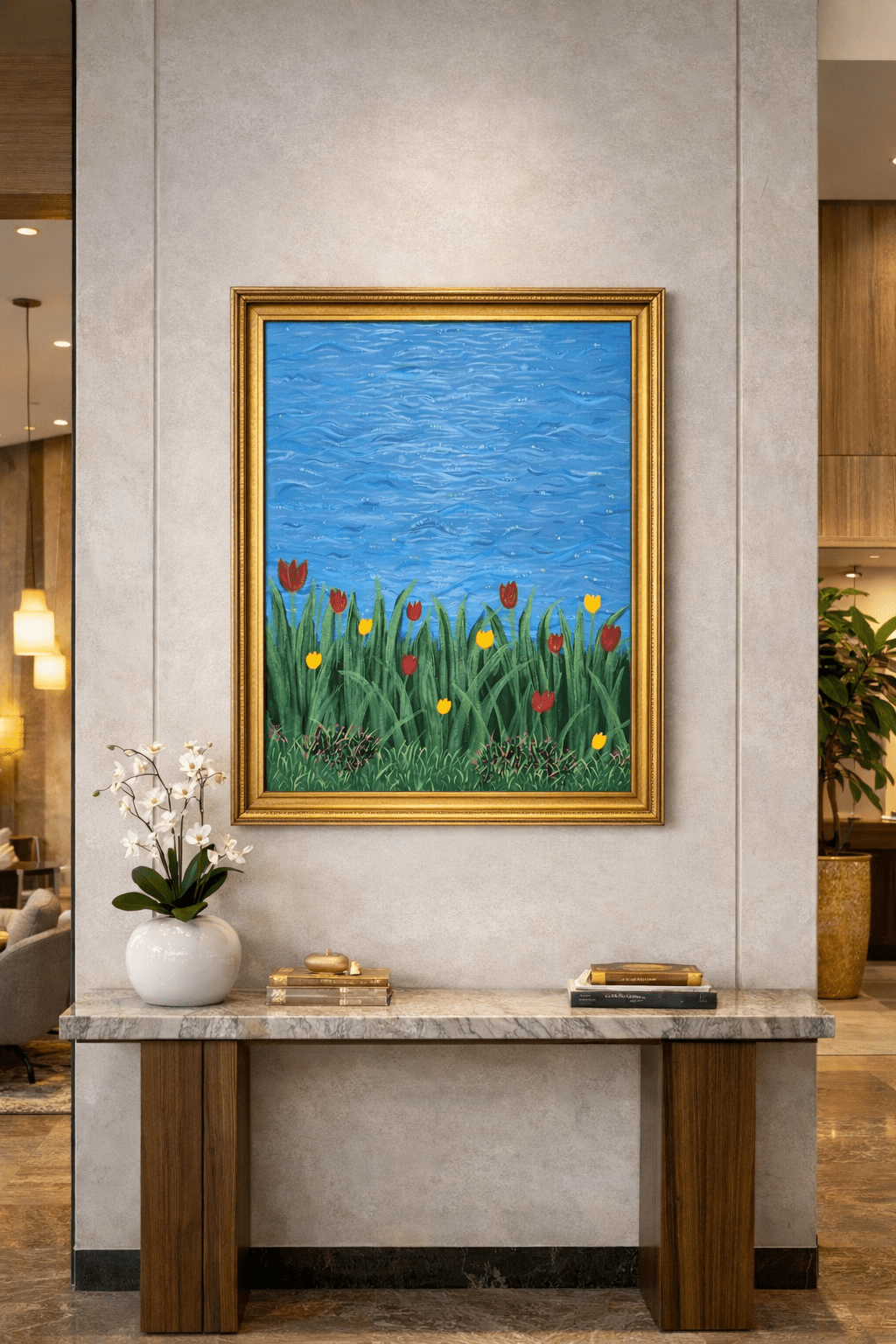 Aqua Melodies original tulip and water painting in a gold frame above a marble console table in a luxury hallway.