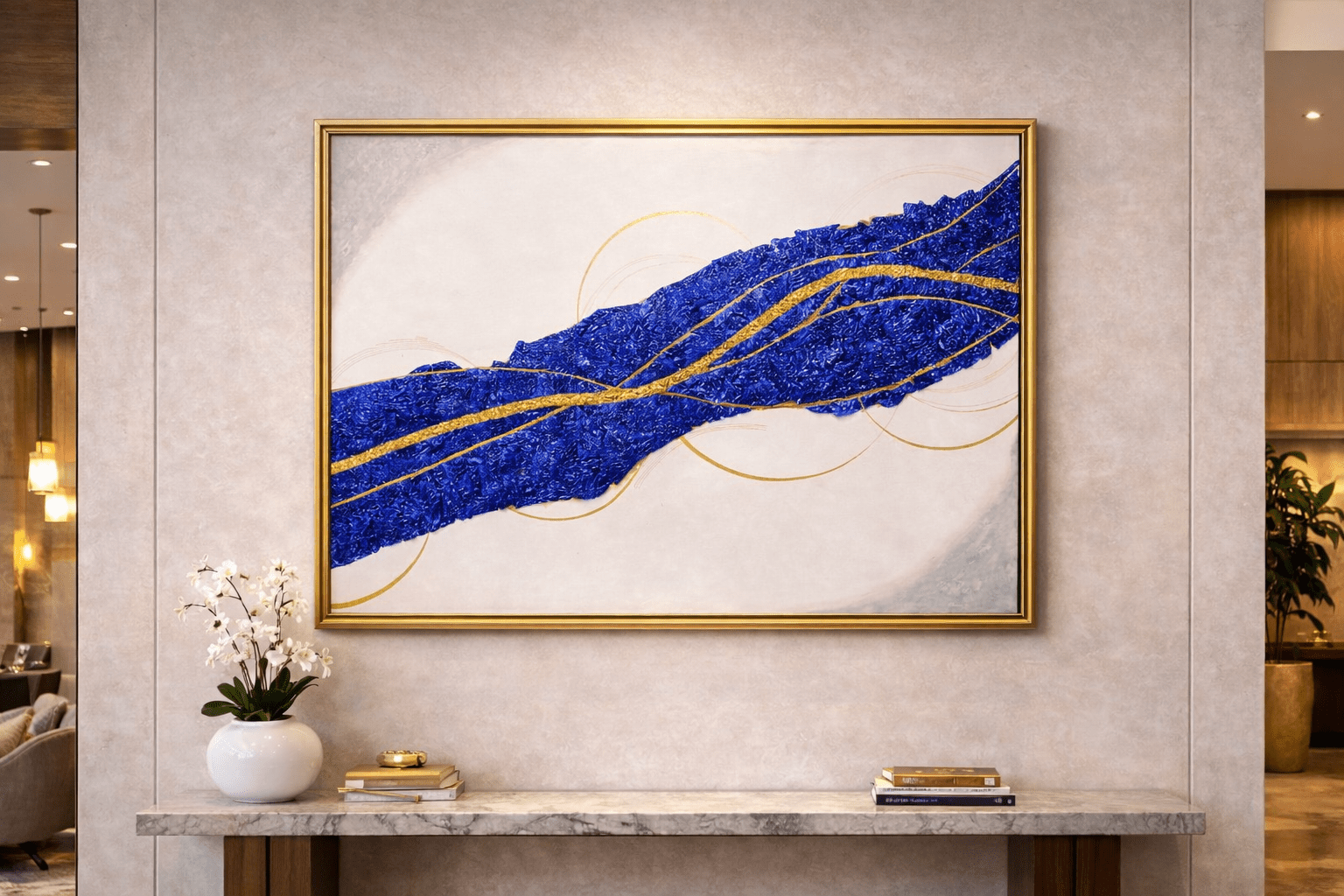Blue River of Time original cobalt and gold abstract painting displayed in a luxury gold-framed entryway