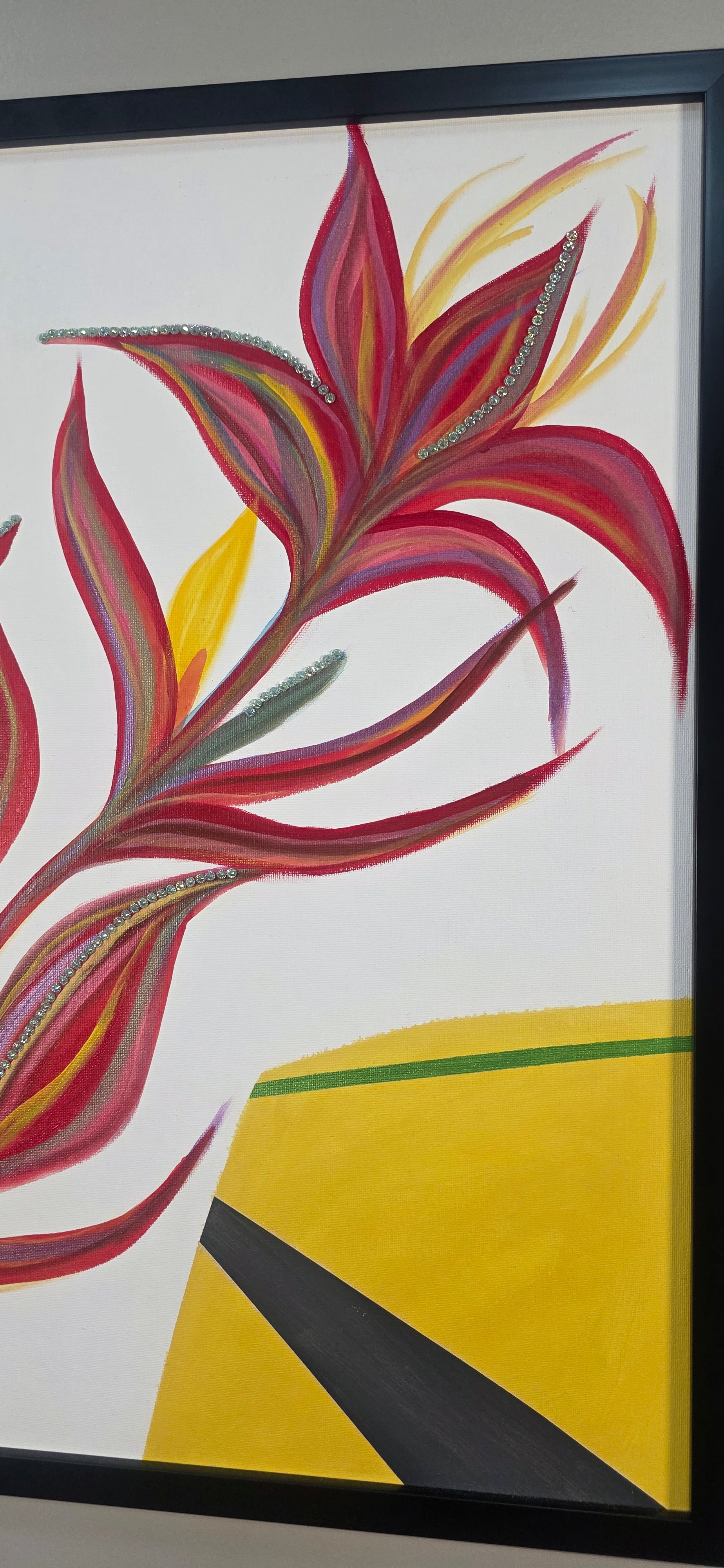 Side-angled view of Heliconia Bloom highlighting the shimmering accents and the clean black frame