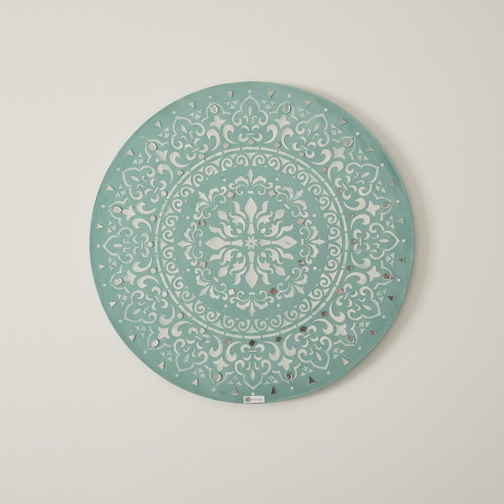 Full front view of the original Mint Mandala Radiance artwork, showcasing the white geometric patterns and reflective glass
